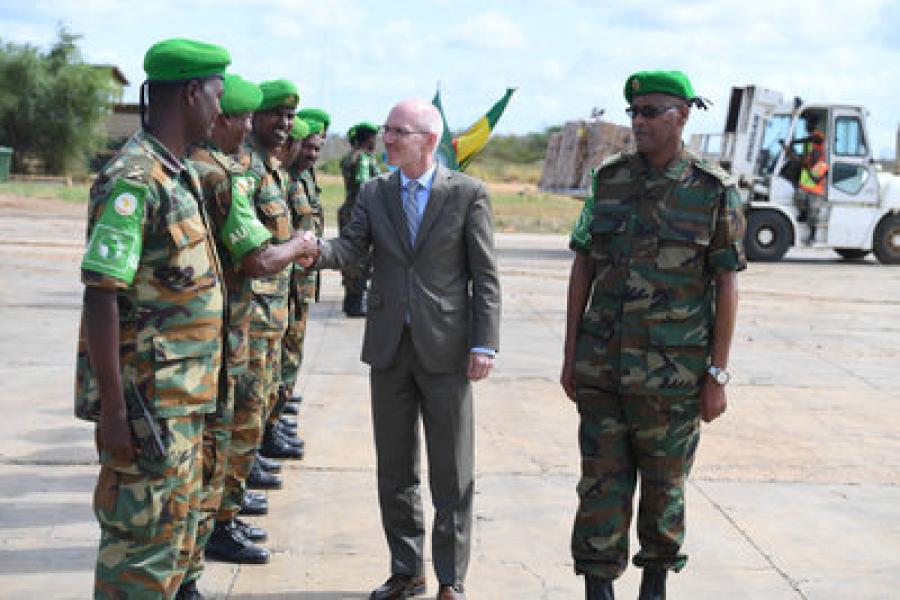 The UN Secretary-General's Special Representative for Somalia, James Swan receives a guard of honor by AMISOM troops at Baidoa Airport during a visit to Baidoa, South West State on 18 July 2019