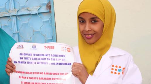 Farhiya participating in a child and early marriage campaign in 2018